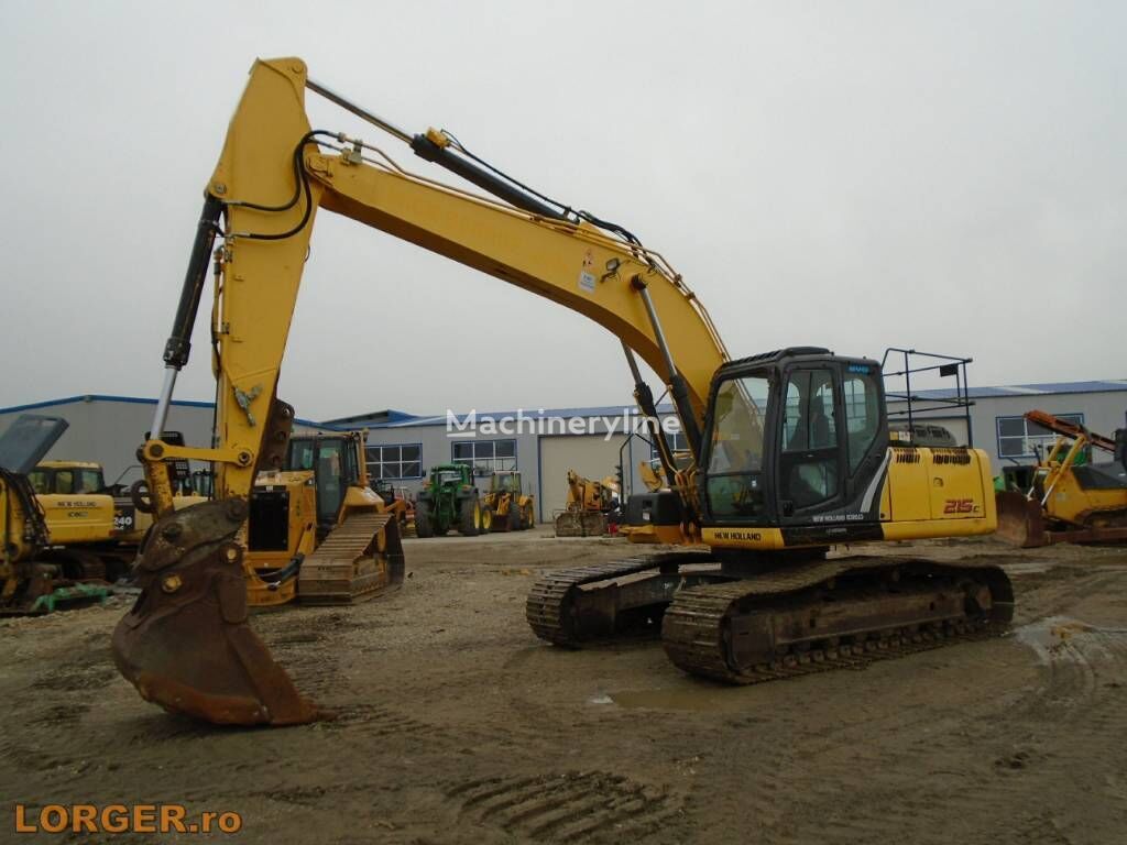 pelle sur chenilles New Holland E 215 C