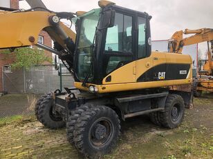 pelle sur pneus Caterpillar M322D